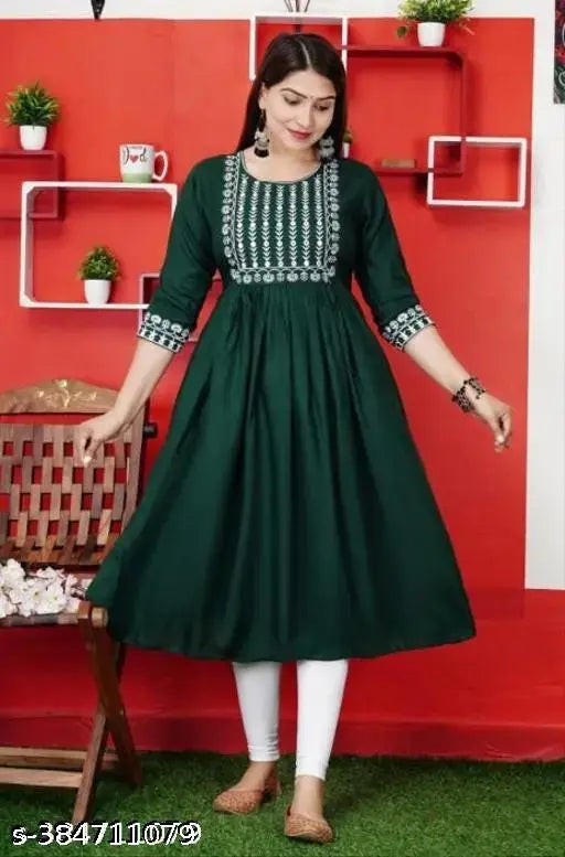 A dark green long-sleeved embellished dress with a flared skirt and buttoned front