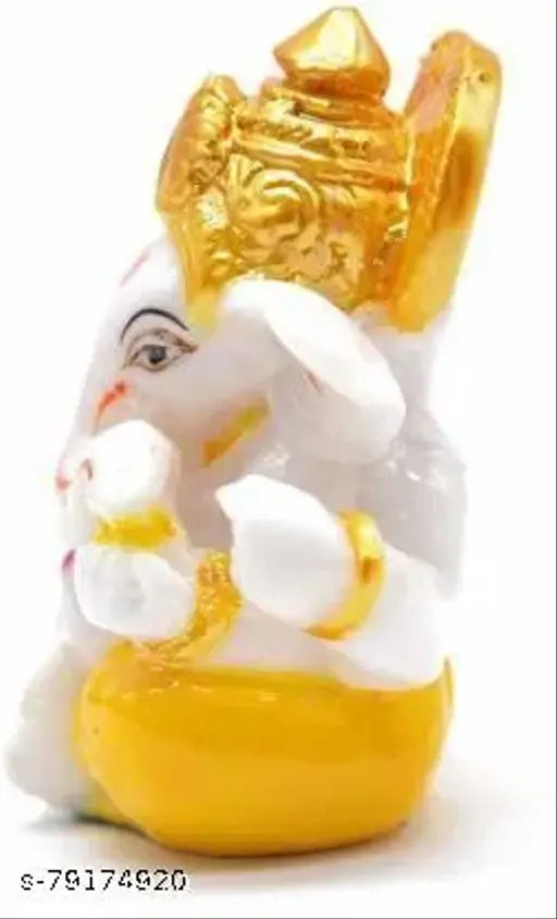 Two-faced crystal Ganesha statue, handcrafted from India. Perfect car dashboard idol or home temple decoration for Ganesh Chaturthi." (103 characters)