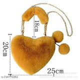 Yellow plush heart-shaped crossbody bag with chain strap and pom pom balls, fluffy shoulder bag for women ladies