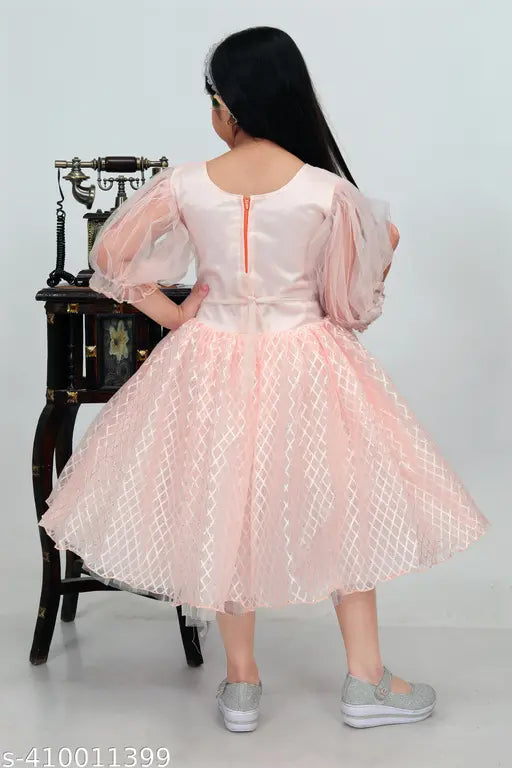 Peach frock with light pink lace trim, fitted waist
