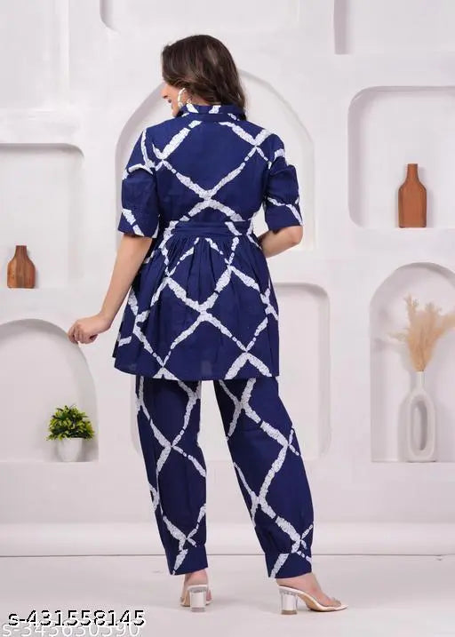 Blue rayon pyjamas set with printed net pattern, featuring short sleeves and matching bottoms. New cotton set from India (M-XXXL sizes available)