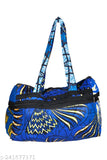 Blue floral fabric handbag with handles, multiple pockets, and adjustable shoulder straps