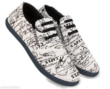 White canvas sneakers with black laces and a newspaper print pattern