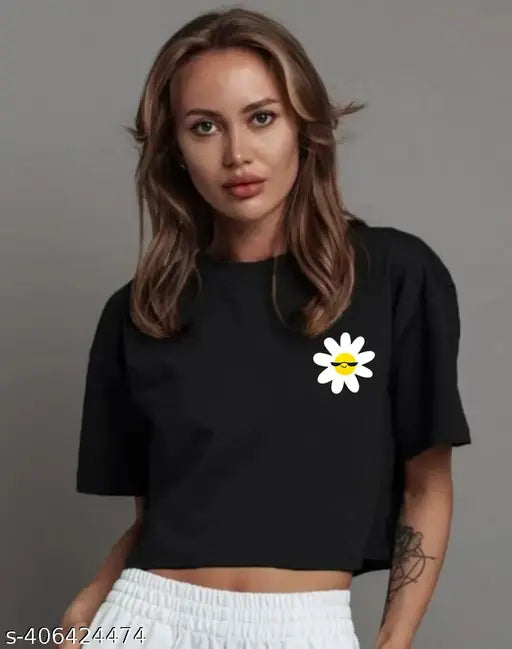 Stylish black cotton blend crop top with flower print, perfect for young women's daily wear. Crop top trendy top for women's style refresh
