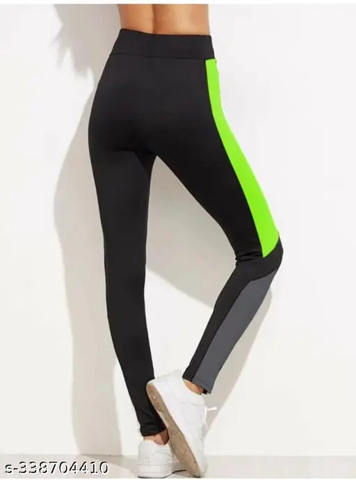 Stretchable striped sports track pant for women & girls in colorblocked pattern, size 28-34 inch. Ideal for yoga and gym workouts. Made from breathable lycra fabric