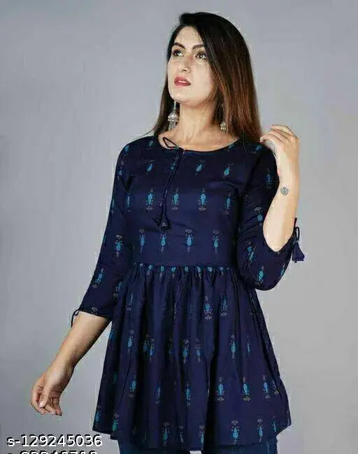 Trendy blue rayon tunic top with three-quarter sleeves, printed net pattern, available in multiple sizes XS to 4XL, Indian origin