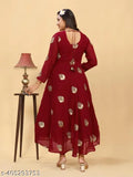 Maroon floor-length traditional women's outfit with blouse and skirt