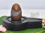 Brown marble Stone Narmadeshwar Shivling for home puja, pack of 1 on display