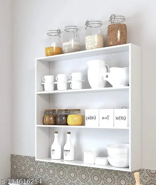 White wall hanging kitchen shelves with food items and jars