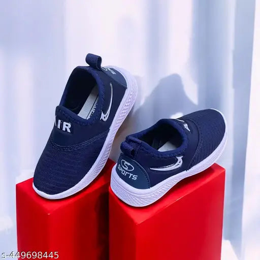 Blue and white slip-on boys' shoes, with Nike swoosh symbol on side