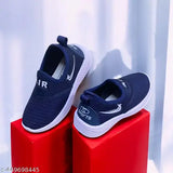 Blue and white slip-on boys' shoes, with Nike swoosh symbol on side