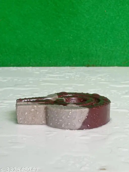 Narmadeshwar stone jaladhari ornament, red and gray swirls, 3 inches.