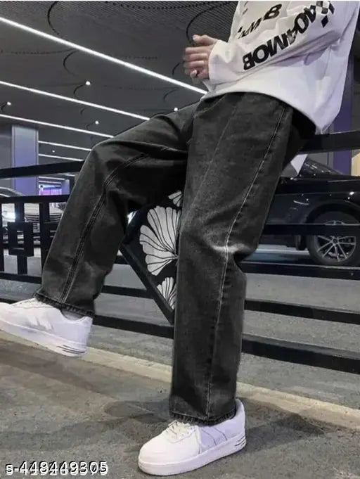 New style men's denim jeans with white sole sneakers sitting on railing