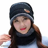 Gray knit cap with pompom, black trim
