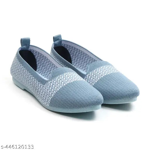 Light blue ballerina flats with bow embellishments