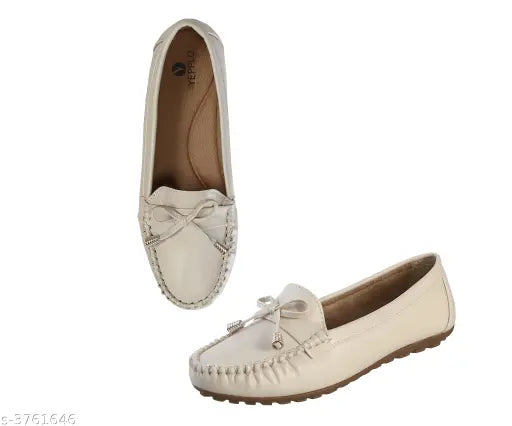 Synthetic leather trendy feminine loafer, slip-on design in solid pattern, available in sizes IND-4 to IND-9 from India