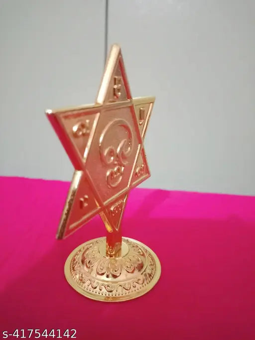 Golden Metal Murugan SARAVANA Vel - 3.5 inch high, intricately crafted representation of Lord Murugan's sacred symbol for pooja rooms and gifting, featuring radiant golden finish and star shape design