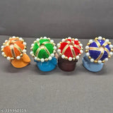 Multicolor Alaukik polyresin baby monk Buddha idols (4 pcs) - Indian-crafted home decor with calm, positive energy