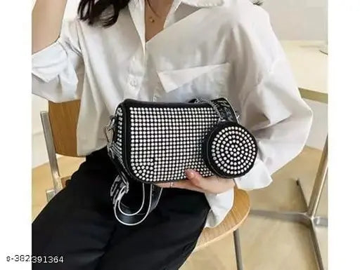VIYARO Crossbody Sling Bag with detachable broad belt. Black sequin fabric, gold tone metal accents. Handbag with wide shoulder straps and side square bling