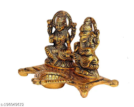Metal Lakshmi Ganesha showpiece statue, traditional oil lamp for Diwali decoration and Puja