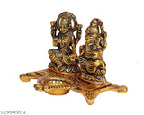 Metal Lakshmi Ganesha showpiece statue, traditional oil lamp for Diwali decoration and Puja