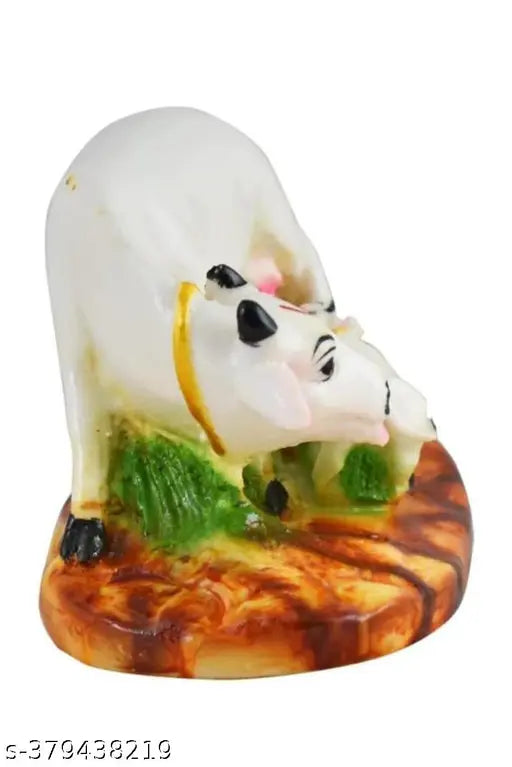 Kamdhenu Kamadhenu Idol Murti Statue Cow with Calf Statue is made of fine grade Polyresin.