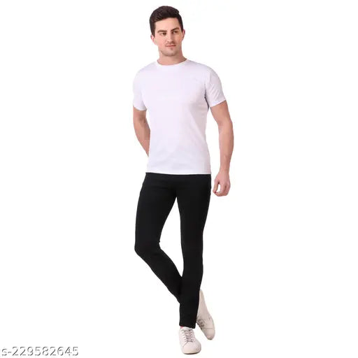 Men's slim fit black denim jeans with stretchable fabric, solid print, mid-rise design. Close-up of high-quality dark wash jeans with buttons and zip closure. Product color may slightly vary due to display settings. Sizes available: 28 (waist 28 in, length 41 in), 30 (waist 30 in, length 41 in), 32 (waist 32 in, length 41 in), 34 (waist 34 in, length 41 in), 36 (waist 36 in, length 41 in). Made in India