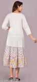 Multicolor rayon Anarakali floral print kurti for parties, three-quarter sleeves, white embroidered details, Indian ethic wear on display