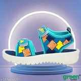 Green canvas slip-on kids sandals, navy and light blue pattern