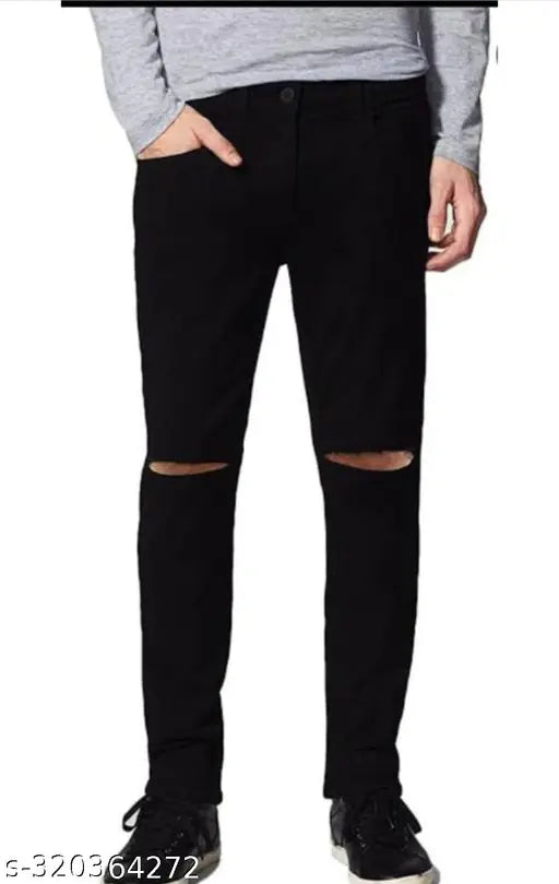 Black denim flaying men's knee-slit jeans on model, solid pattern, size 28/30/32 (Waist 28/30/32, Length 41in, Hip 32/34/36), made in India