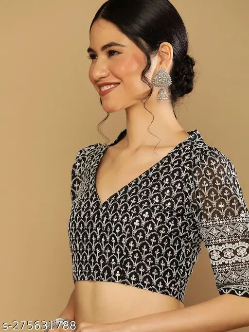 Black and white georgette saree with schiffli embroidery blouse