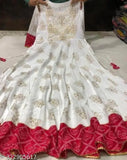 White rayon Anarkali kurti with embroidery, traditional Indian attire on mannequin