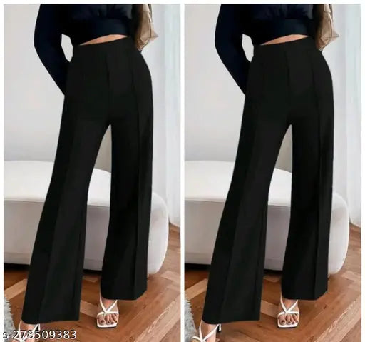Dark blue flared pants with a slight stretch and high waist