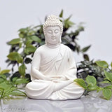 White resin Buddha statue, meditation/Dhyan Lord Gautam figure for home decor, living room, bedroom, office, desk, gifting. Dimensions: 9cm x 10cm x 10cm (LxHxW). Made in India