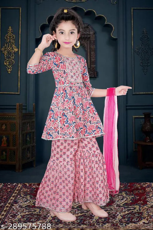 Cotton silk printed Girls Kurta Sharara & Dupatta set, fine quality poly silk with lace embellishments. Knee-length, straight top with three-quarter sleeves, season and occasion versatile. Indian fashion for 2-12 years old