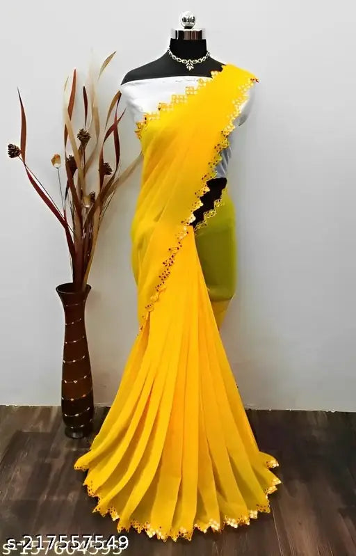Yellow georgette saree with mirror work