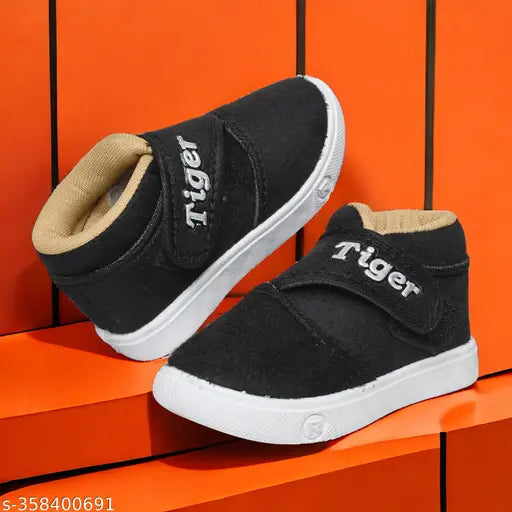 Latest velvet kids' sneakers, black with gold text