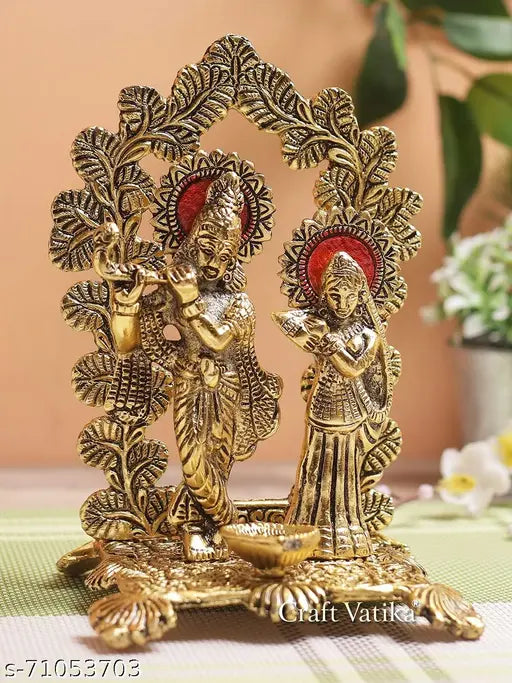 Golden aluminum oxidized CraftVatika Metal Radha Krishna Idol with diya, intricately designed and featuring Lord Krishna playing the flute alongside Radha