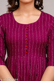 Rayon printed Anarkali kurta with three-quarter sleeves, a modern style for women's wardrobe. Indian-made, flared long kurti perfect for functions, events, and daily wear