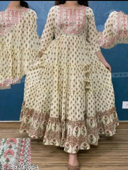 Cream floral print viscose rayon three-quarter sleeve gown on mannequin, embroidery and heavy border details, India origin