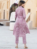 Rayon printed straight kurta set with matching viscose rayon pants, featuring three-quarter sleeves and a net pattern, ideal for women's casual wear. India origin