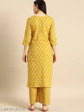 Women's rayon printed straight kurti with three-quarter sleeves, vibrant Indian pattern on display