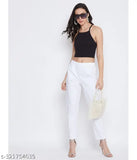 White cotton 118 pants with drawstring waist, worn by a woman.