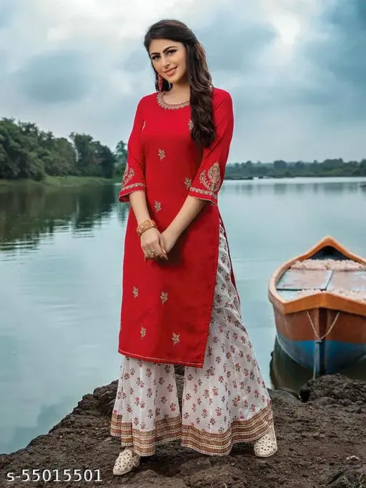 Majesty Pink Rayon Printed Kurti with Embroidery and Fancy Skirt