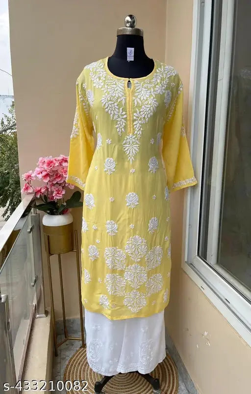 Modal fabric chickankari work Kurti and Plazzo, embroidered traditional design in rayon fabric for women, printed net pattern, three-quarter sleeves set with matching bottomwear. Rayon Kurta with Palazzos available in various sizes from M to 6XL, origin India