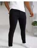Black cotton blend flaying men jeans S2IQO, solid-colored denim for men's wardrobe on mannequin