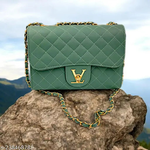 A sling bag in blue with a Pu leather texture and gold zippers, designed for women