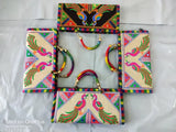 Colorful, embroidered handbag with two handles and four card slots