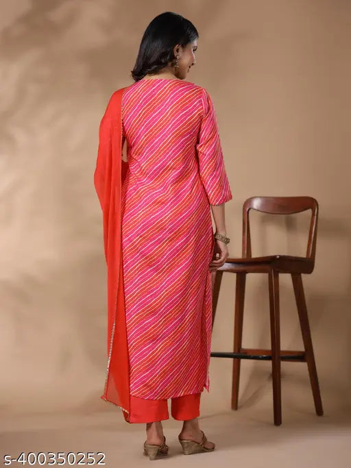 Multi-colored printed cotton blend kurta set with palazzos and dupatta, featuring three-quarter sleeves. Women's Indian fashion wear in various sizes
