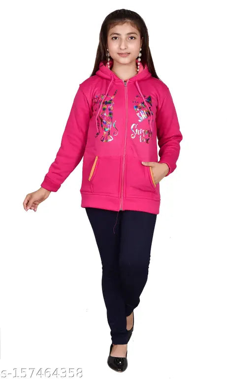 Pink hoodie with zipper, worn by a young girl standing